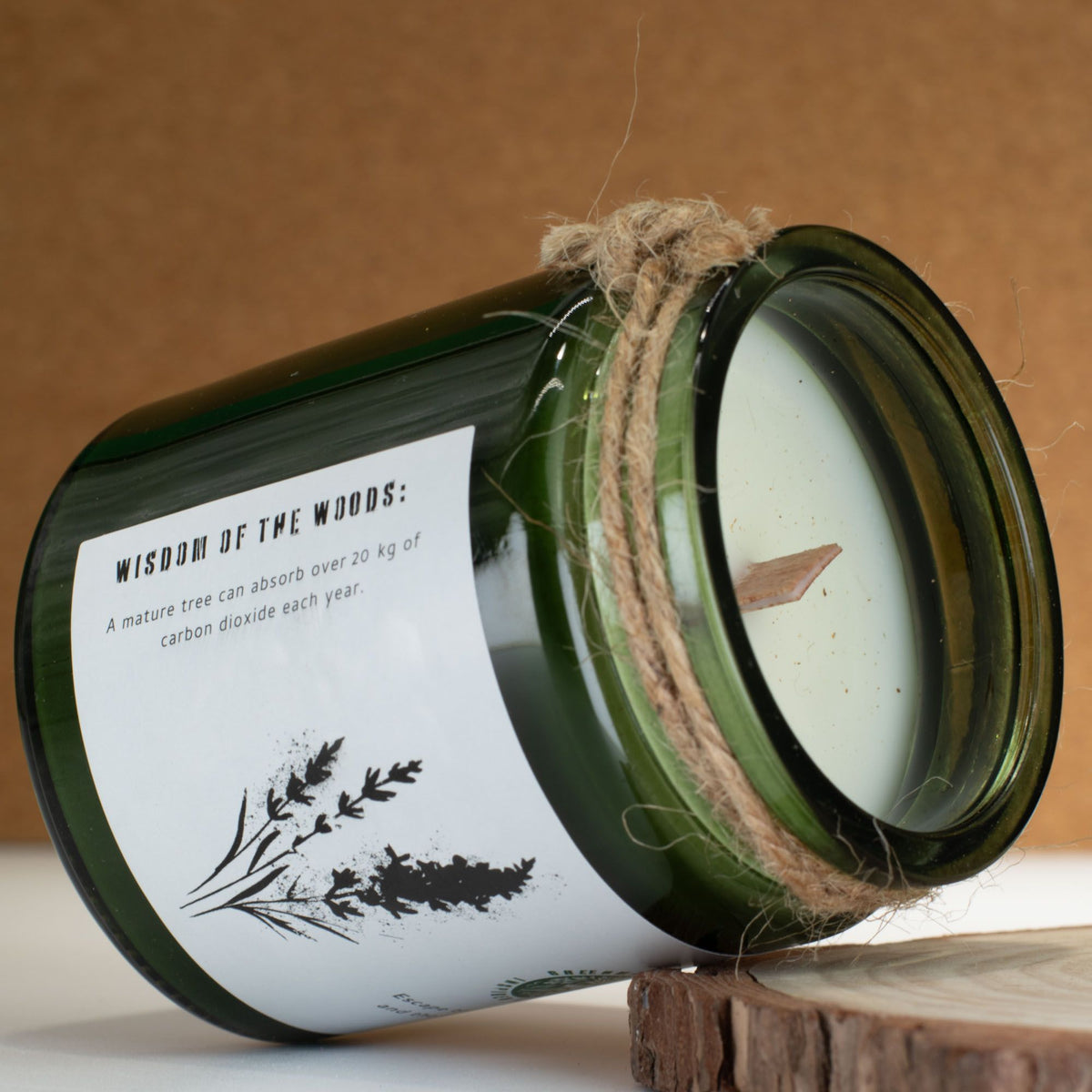 Wild Lavender Woodwick Candle in a green glass jar