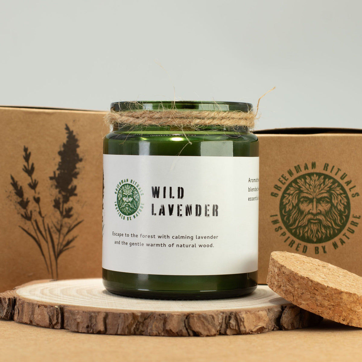 Wild Lavender Woodwick Candle in a green glass jar