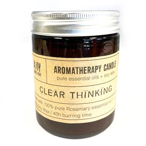 Clear Thinking Aromatherapy Candle in an amber glass jar