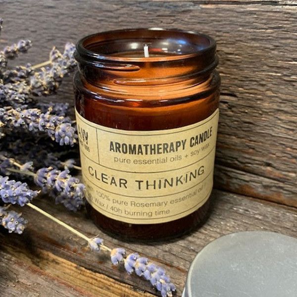 Clear Thinking Aromatherapy Candle in an amber glass jar